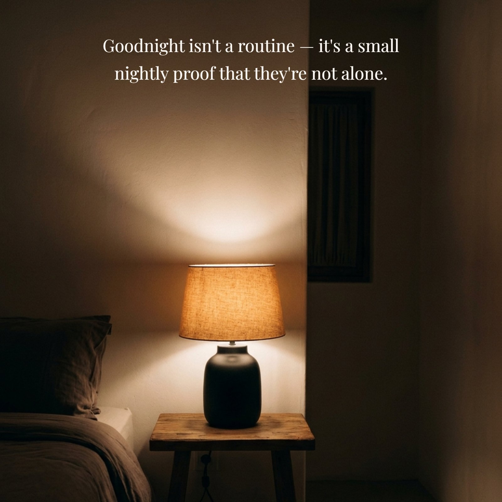 Minimalist photo of a single dim bedside lamp with warm tones and the quote Goodnight isn't a routine — it's a small nightly proof that they're not alone.