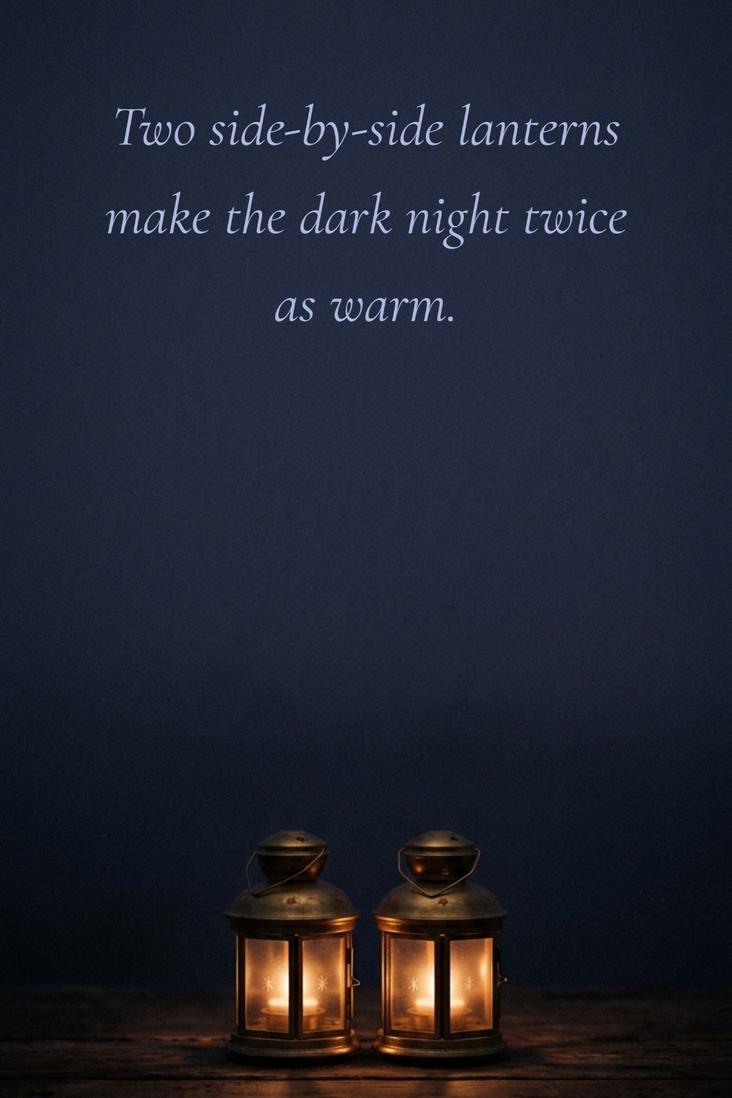 The text "Two side-by-side lanterns make the dark night twice as warm" is displayed in elegant serif font above two vintage lanterns glowing with candle light on a wooden surface against a deep blue background.
