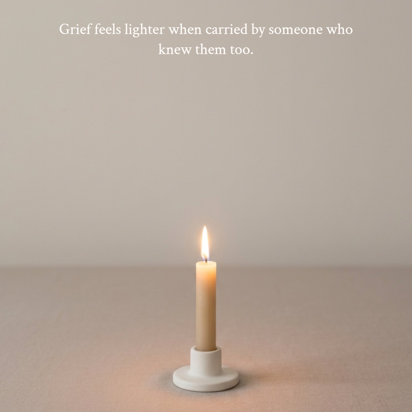 Minimalist 1:1 square photo of a single lit taper candle on a neutral linen surface, casting a warm glow. The top negative space features the quote, “Grief feels lighter when carried by someone who knew them too.”