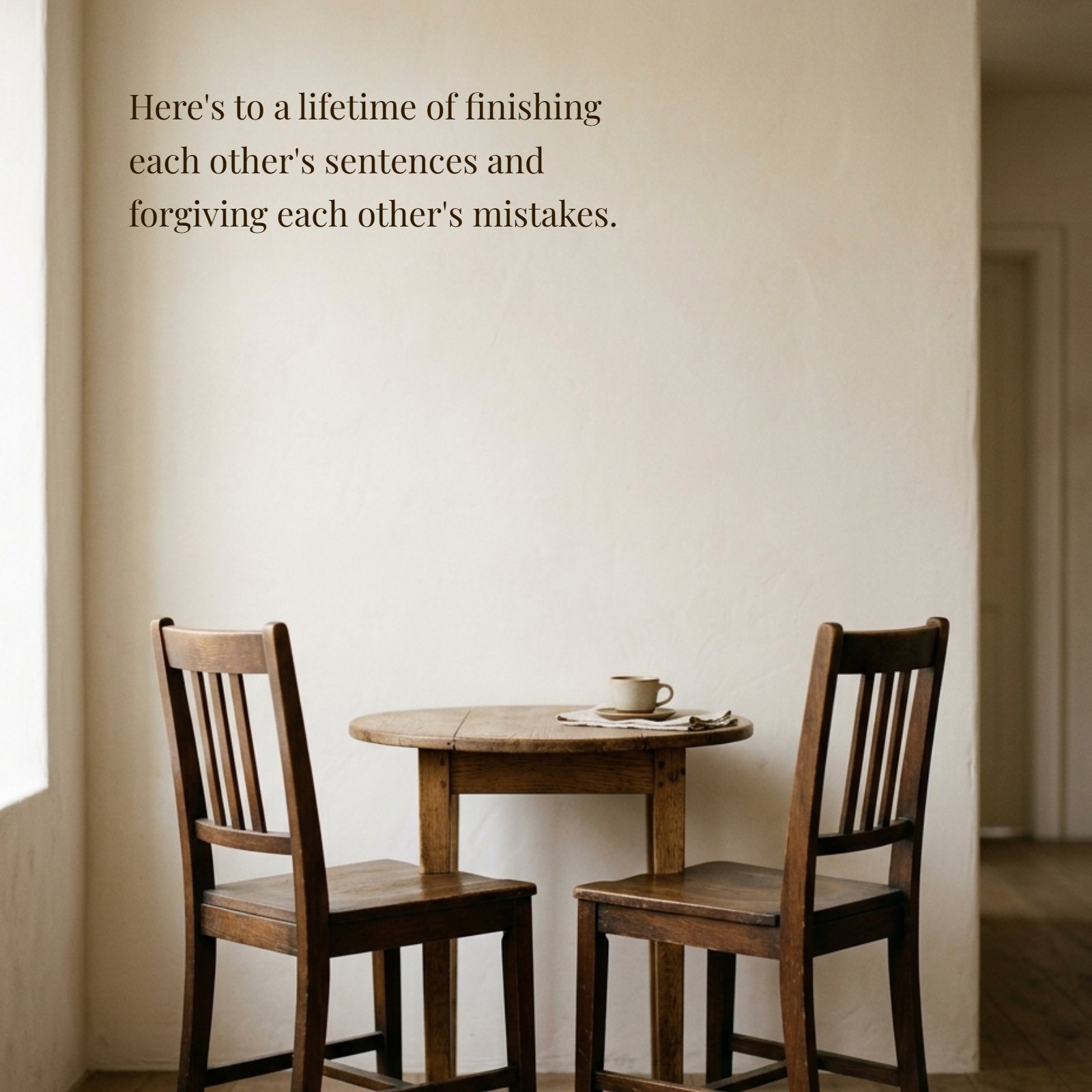 Minimalist image of two wooden chairs and a table against a plain wall, representing the companionship and connection in a marriage.