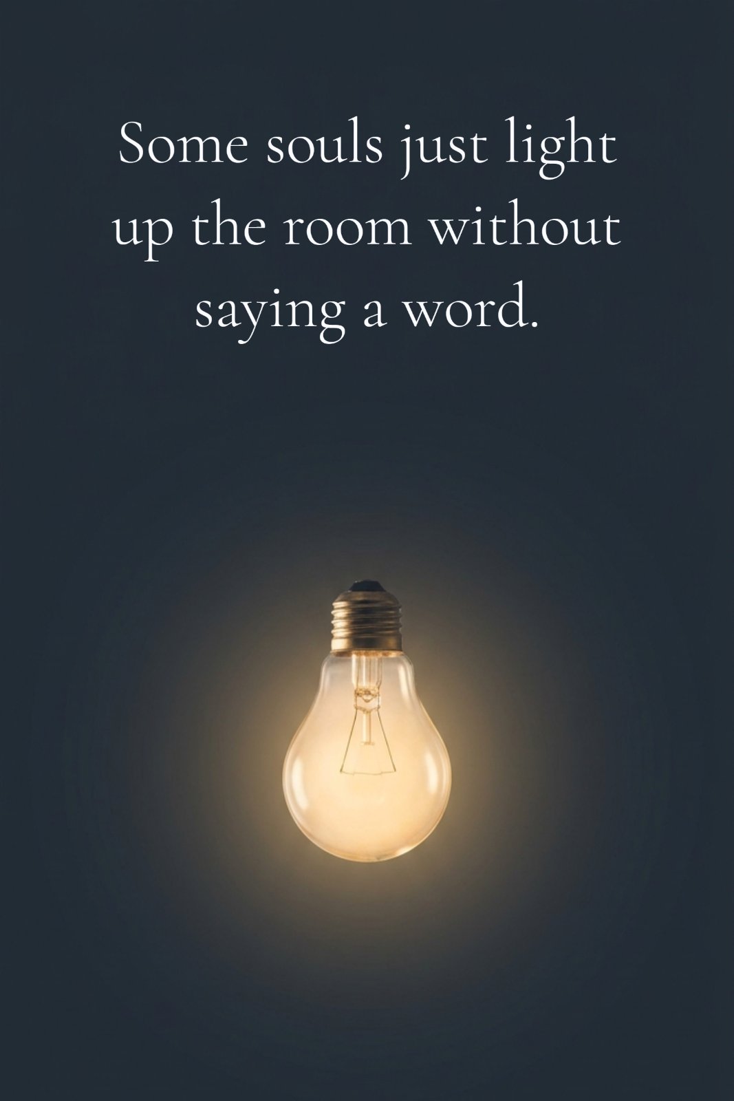 A single delicate glass bulb emitting a soft golden glow against a dark, empty slate-blue background, visually representing the quote "Some souls just light up the room without saying a word."